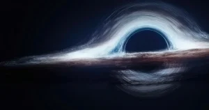 Representación artística de un agujero negro en el espacio, con su disco de acreción brillante