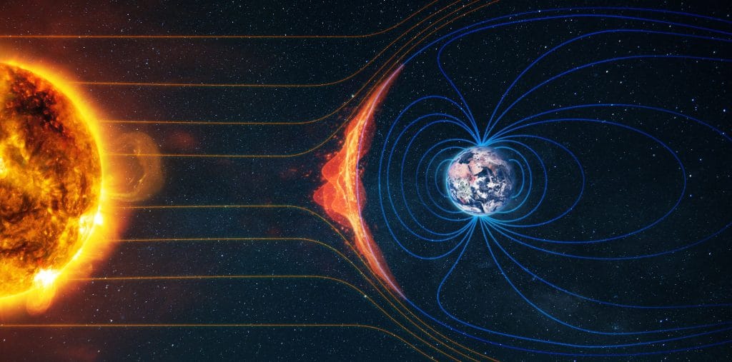 Ilustración de un campo magnético planetario desviando partículas del viento estelar para proteger la atmósfera